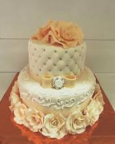 Торт с цветами и обивкой в оранжевом цвете
